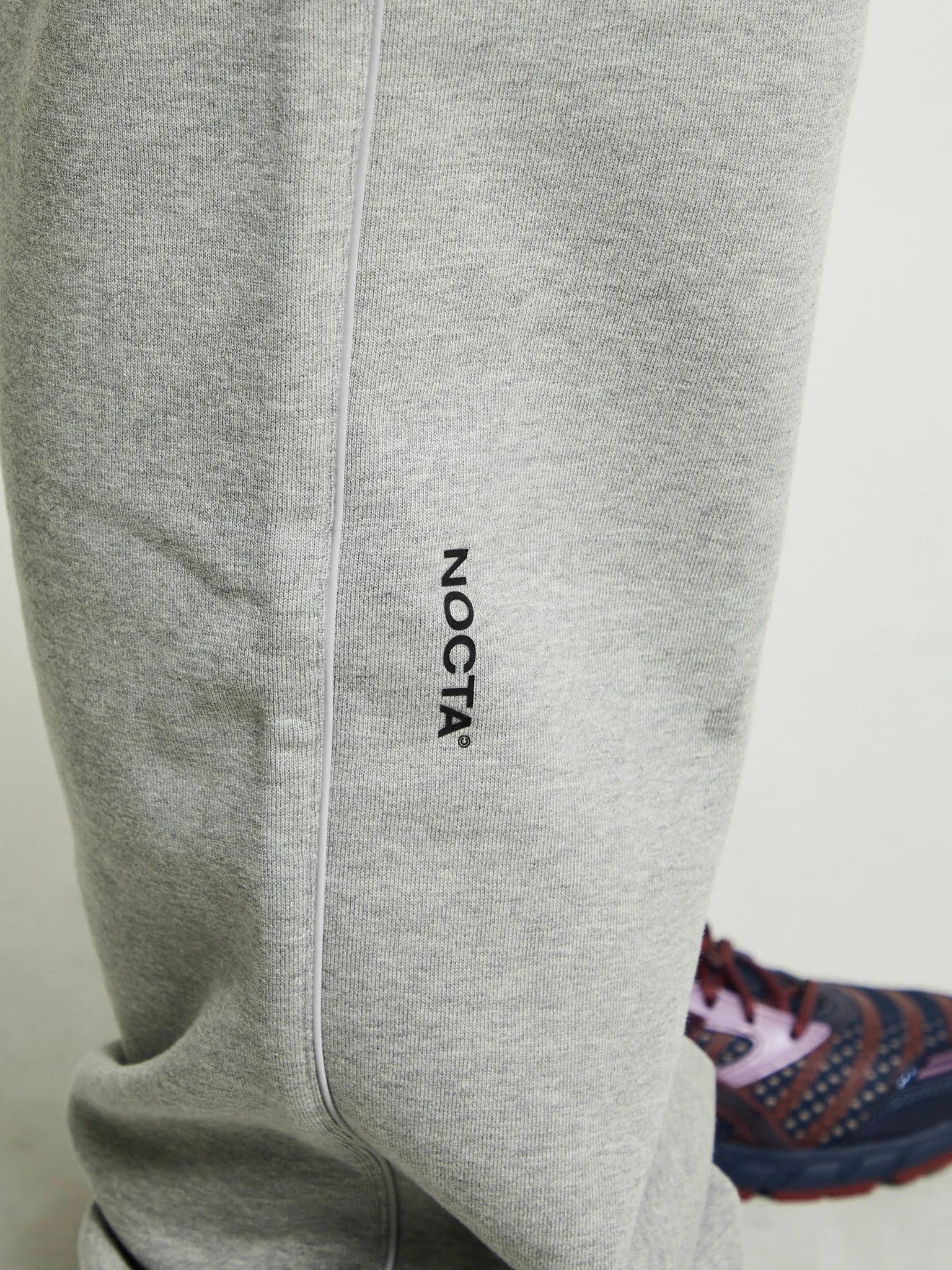 NOCTA Fleece Open-Hem Sweatpants in Dark Heather Grey and Matte Silver